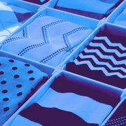 Sock drawer of colorful socks with gift card icon overlay.