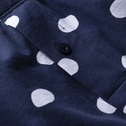 Close up detail shot of navy blue slim fit boxer with white hand drawn dots printed on.